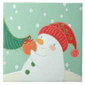 Ein Schneemann, der eine Verzierung auf einem Baum Fliese (Vorderseite)