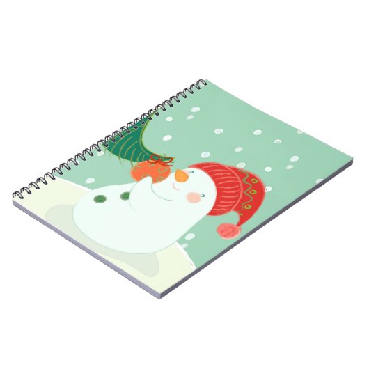 Ein Schneemann, der eine Verzierung auf einem Baum Notizblock (Linke Seite)