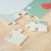 Ein Schneemann, der eine Verzierung auf einem Baum Puzzle (Seite)