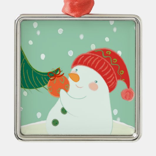 Ein Schneemann, der eine Verzierung auf einem Baum Silbernes Ornament (Vorne)