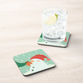 Ein Schneemann, der eine Verzierung auf einem Baum Untersetzer (Rechte Seite)