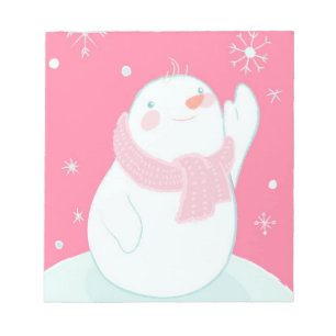 Ein Schneemann, der für eine fallende Schneeflock Notizblock
