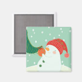 Ein Schneemann hängt ein Ornament an einem Baum Magnet (Vorderseite/Rückseite)