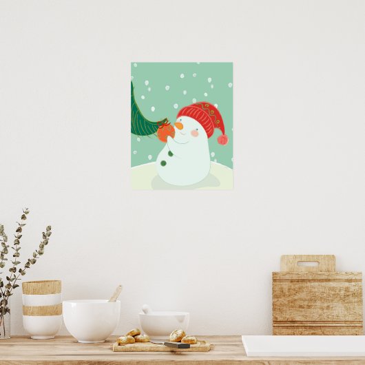 Ein Schneemann hängt ein Ornament an einem Baum Poster (Küche)