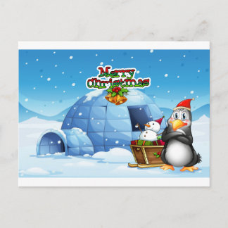 Ein Schneemann und ein Pinguin vor dem Iglu Postkarte