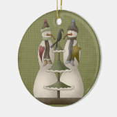 Ein schneeweißer Weihnachtsschmuck der Keramik (Links)