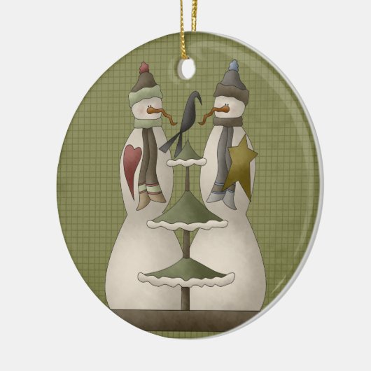 Ein schneeweißer Weihnachtsschmuck der Keramik (Links)