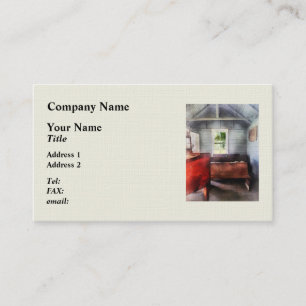 Ein Schulhaus mit Hurrikan-Lampe Visitenkarte