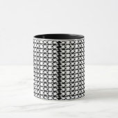 ein Schwarz-Weiß-Foto eines Musters Tasse (Zentrum)