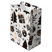 Ein Schwarz-Weiß-Weihnachtsmuster Mittlere Geschenktüte (Rückseite Schrägansicht)