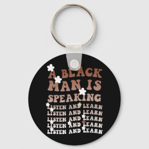 Ein Schwarzer hört zu und lernt ihn schwarz Schlüsselanhänger