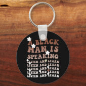 Ein Schwarzer hört zu und lernt ihn schwarz Schlüsselanhänger (Vorderseite)