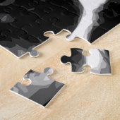 Ein Schwarzweiss-Boston-Terrier Puzzle (Seite)