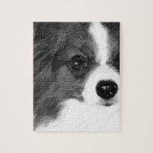 Ein Schwarzweiss-Papillon Puzzle (Vertikal)