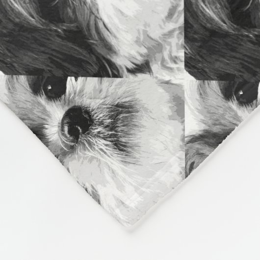 Ein Schwarzweiss-Shih tzu Fleecedecke (Ecke)