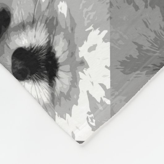 Ein Schwarzweiss-Spitz Fleecedecke (Ecke)