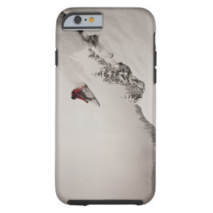 Ein Snowboarder springt weg von einer Klippe in Tough iPhone 6 Hülle