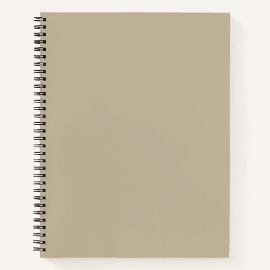 Ein solider brauner Hintergrund mit einem glatten, Notizblock (Vorderseite)