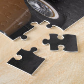 Ein Studebaker Silver Hawk Oldtimer, der auf einer Puzzle (Seite)