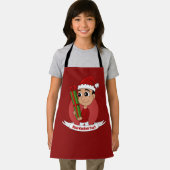 Ein süßer Kleinkind, der ein Weihnachtsgeschenk hä Schürze (Insitu)