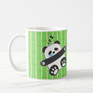 Ein süßes Baby-Panda schläft friedlich Kaffeetasse