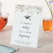 Ein süßes Ende für ein neues Beginning-Abschluss-Z Sockelschild (In Situ)