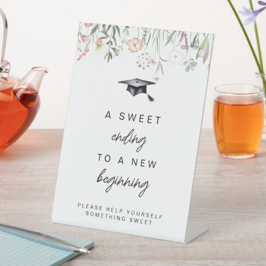 Ein süßes Ende für ein neues Beginning-Abschluss-Z Sockelschild (In Situ)