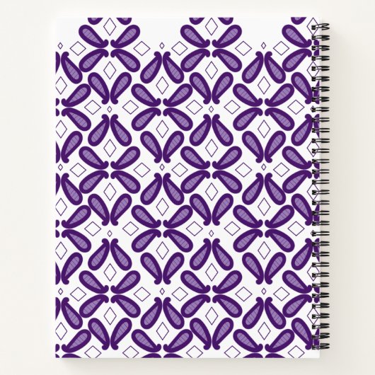 Ein symmetrisches Muster mit weißem und lila m Notizblock (Rückseite)