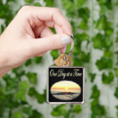 EIN TAG IN EINEM ZEITLICH SONNENRISE-FOTO SCHLÜSSELANHÄNGER (Hand)