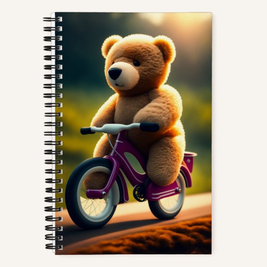 Ein Teddybär, der ein FahrradNotebook fährt Notizblock (Vorderseite)