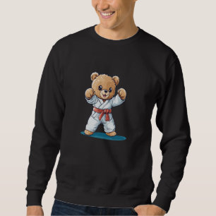 Ein Teddybär, der Karate kennt, bewegt sich für ei Sweatshirt