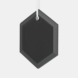 Ein texturierter schwarzer Hintergrund füllt das B Ornament Aus Glas