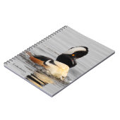 Ein überraschender, gehobener Merganser Notizblock (Linke Seite)