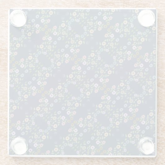 Ein Untersetzer aus Glas mit Blumendruck (Rückseite)