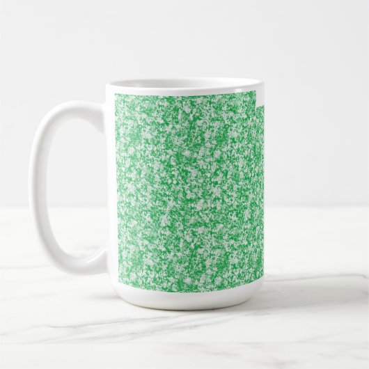 Ein üppiger, grüner Farn mit zarten, rauen Fronten Kaffeetasse (Links)