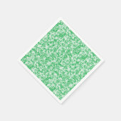 Ein üppiger, grüner Farn mit zarten, rauen Fronten Serviette (Ecke)