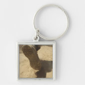 Ein US-Soldat läuft auf einem schmutzigen Pfad Schlüsselanhänger (Vorne)