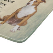 Ein verwöhnter Rottengrubenbull lebt hier Schneidebrett (Ecke)