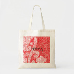 Ein verziertes Paisley-Design mit Rot und Bl Tragetasche