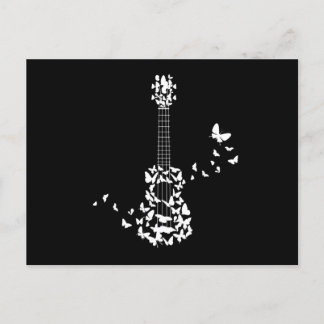 Ein vier String Ukulele Instrument mit wunderschön Postkarte