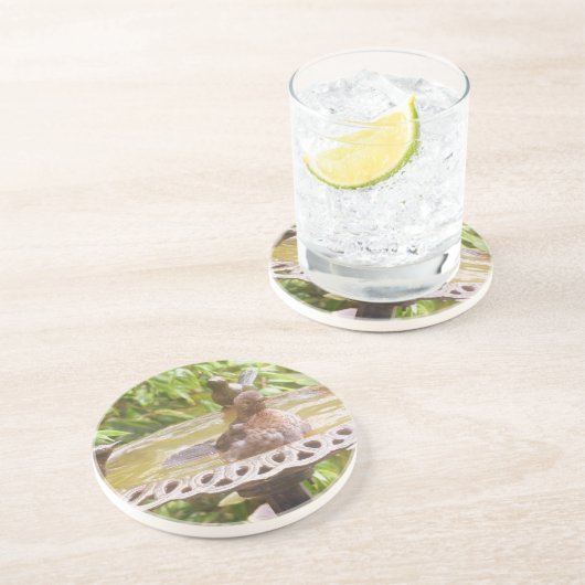 Ein Vogel im Bad Getränkeuntersetzer (Seite)