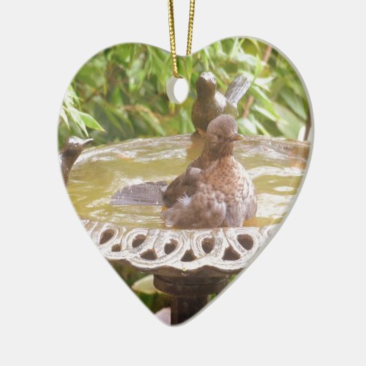 Ein Vogel im Bad Keramikornament (Links)