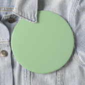 Ein weicher, blassgrüner Hintergrund füllt das Bil Button (Beispiel)