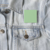 Ein weicher, blassgrüner Hintergrund füllt das Bil Button (Beispiel)