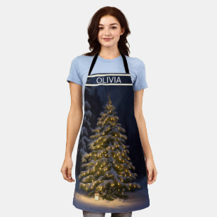 ein Weihnachtsbaum wird in einem schneebedeckten W Schürze