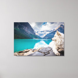 Ein weißer Hund sitzt auf Felsformationen Leinwanddruck