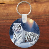 Ein weißer Tiger sitzt im Schnee Schlüsselanhänger (Vorderseite)