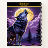 Ein Wolf heult auf Vollmond auf einem Skizzenbuch Notizblock (Rückseite)