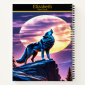 Ein Wolf heult auf Vollmond auf einem Skizzenbuch Notizblock (Rückseite)