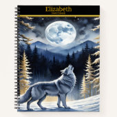 Ein Wolf heult unter Vollmond in einem verschneite Notizblock (Vorderseite)